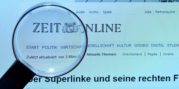 Ein Lupe vergrößert einen Ausschnitt der Webseite von „Zeit Online“ Ein Lupe vergrößert einen Ausschnitt der Webseite von „Zeit Online“
