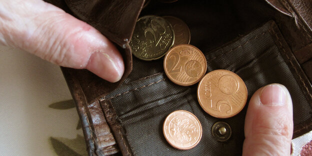Kleingeld in einem Portemonnaie Kleingeld in einem Portemonnaie