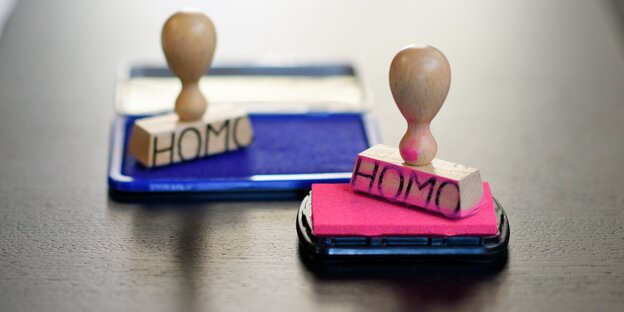 Stempel mit dem Schriftzug "HOMO" Stempel mit dem Schriftzug "HOMO"