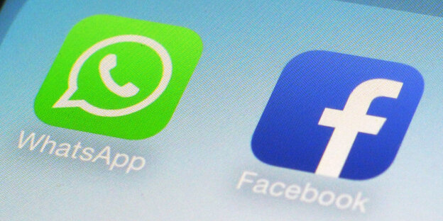 Zwei Symbole zeigen die Apps Whatsapp und Facebook auf einem Smartphone an Zwei Symbole zeigen die Apps Whatsapp und Facebook auf einem Smartphone an