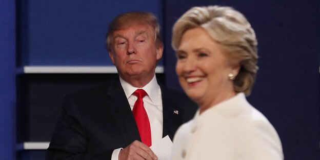 Hillary Clinton, im Hintergrund Donald Trump Hillary Clinton, im Hintergrund Donald Trump