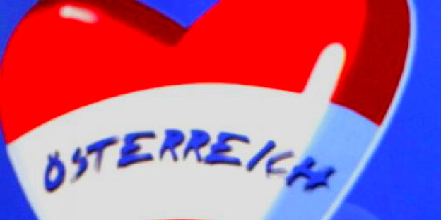 ein rot-weißes Herz auf dem „Österreich“ steht ein rot-weißes Herz auf dem „Österreich“ steht