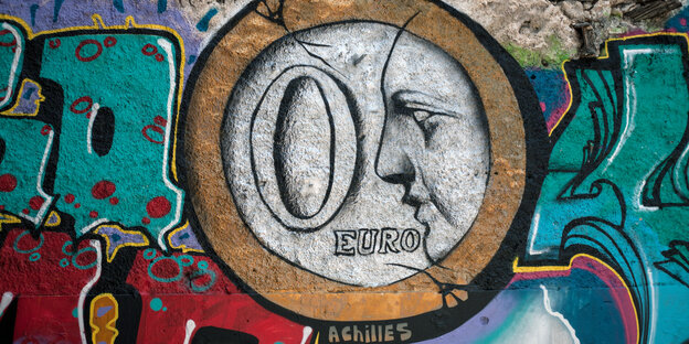 Ein Grafitti zeigt eine Euro-Münze, auf der eine Null steht Ein Grafitti zeigt eine Euro-Münze, auf der eine Null steht