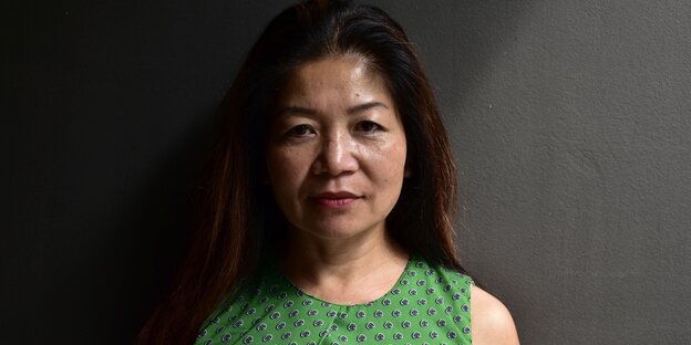 Eine Frau in einem grünen Top. Es ist Mai-Phuong Kollath Eine Frau in einem grünen Top. Es ist Mai-Phuong Kollath