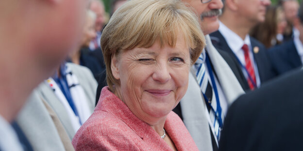Angela Merkel zwinkert Angela Merkel zwinkert