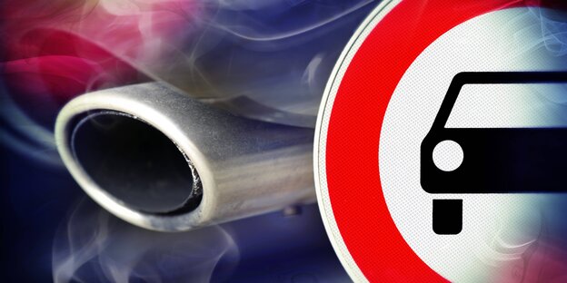 Ein qualmender Auspuff und ein Duchfahrt-verboten-Schild Ein qualmender Auspuff und ein Duchfahrt-verboten-Schild