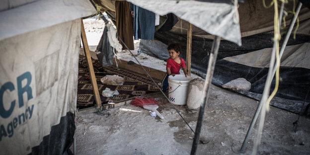 Kind in syrischem Flüchtlingslager. Kind in syrischem Flüchtlingslager.