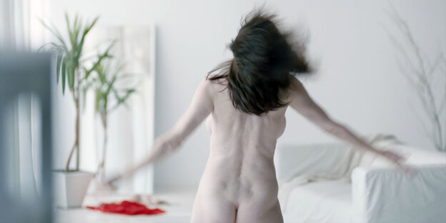 Eine nackte Frau von hinten Eine nackte Frau von hinten