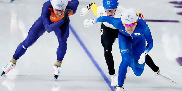 Eisschnellläufer in Aktion Eisschnellläufer in Aktion
