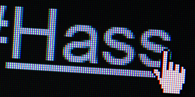 Das Wort Hass ist unterstrichen auf einem Bildschirm zulesen, daneben wird eine Computermaus angezeigt Das Wort Hass ist unterstrichen auf einem Bildschirm zulesen, daneben wird eine Computermaus angezeigt