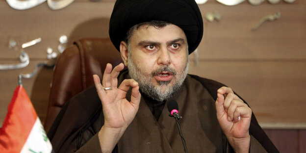 Ein Mann, Muktada al-Sadr Ein Mann, Muktada al-Sadr