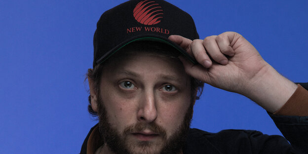 Ein Mann mit Basecap Ein Mann mit Basecap