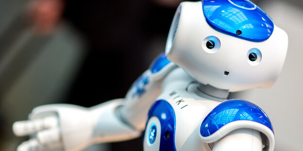 Ein weiß blauer Roboter Ein weiß blauer Roboter
