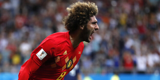 Marouane Fellaini jubelt nach seinem Tor gegen Japan. Marouane Fellaini jubelt nach seinem Tor gegen Japan.