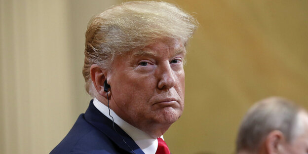 US-Präsident Trump nach seinem Treffen mit dem russischen Präsidenten Putin US-Präsident Trump nach seinem Treffen mit dem russischen Präsidenten Putin
