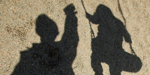 Schatten von Vater mit Kind Schatten von Vater mit Kind