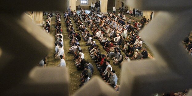 Muslime in einer Moschee Muslime in einer Moschee