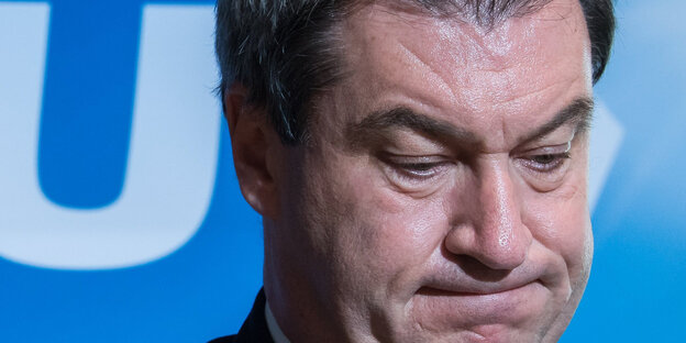 Markus Söder kneift das Gesicht zusammen Markus Söder kneift das Gesicht zusammen