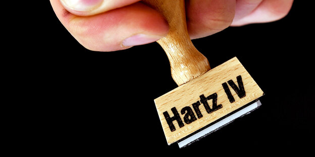 Stempel mit Hartz-IV-Aufschrift Stempel mit Hartz-IV-Aufschrift
