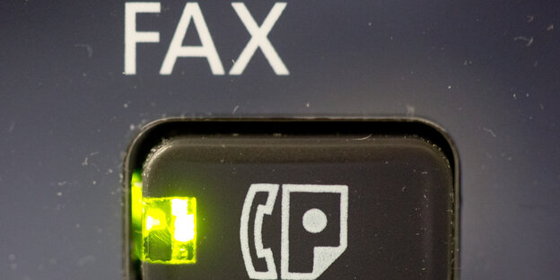 Knopf an einem Faxgerät Knopf an einem Faxgerät