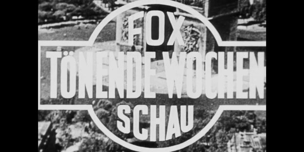 Schriftzug schwarzweiß: "FOX Tönende Wochenschau" Schriftzug schwarzweiß: "FOX Tönende Wochenschau"