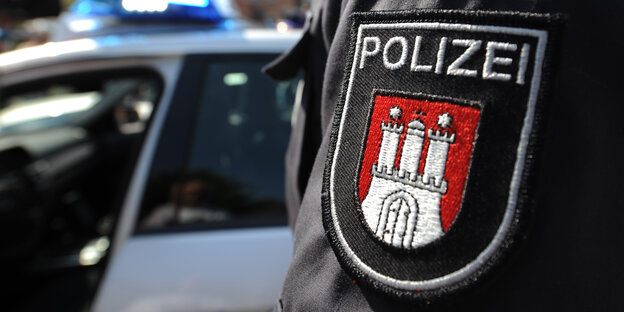 Das Wappen der Hamburger Polizei auf einer Uniform. Das Wappen der Hamburger Polizei auf einer Uniform.