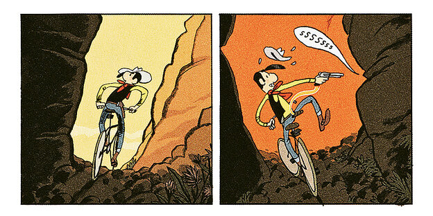 Lucky Luke fährt mit dem Fahrrad durch eine Schlucht Lucky Luke fährt mit dem Fahrrad durch eine Schlucht