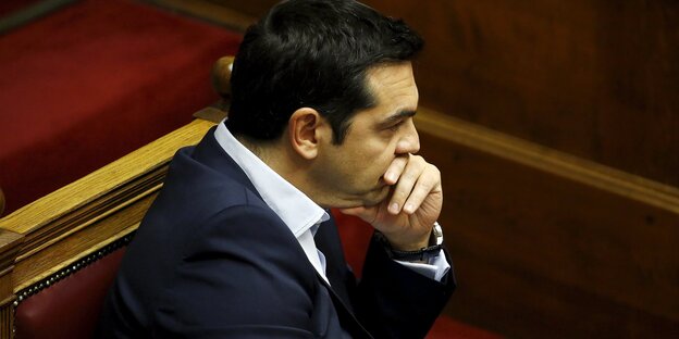 Eine Zeitungstitelseite mit Alexis Tsipras Eine Zeitungstitelseite mit Alexis Tsipras