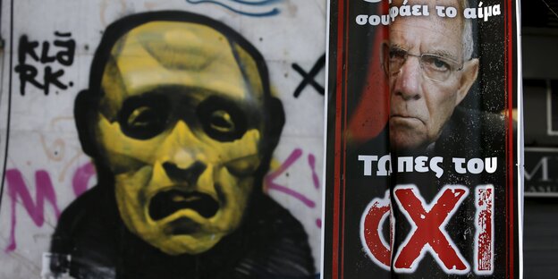 Graffiti und ein Plakat mit Bild von Schäuble Graffiti und ein Plakat mit Bild von Schäuble