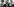 Schwarz-Weiß-Aufnahme: Jonas Mekas hält eine Tascheniuhr in die Kamera und lächelt. Er trägt ein Sakko und Krawatte