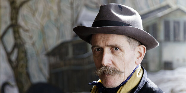 Billy Childish wears a hat