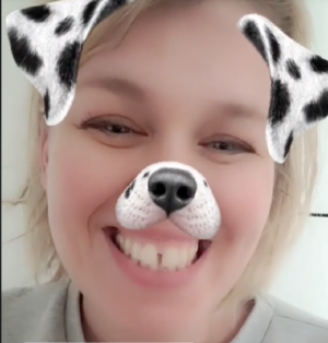 A picture of the author with the Snapchat dog filter