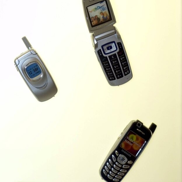 Drei alte Mobiltelefone