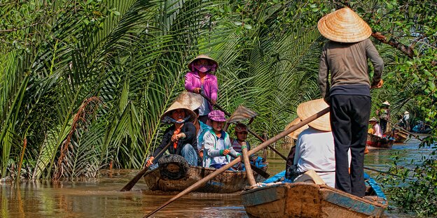 Reisende auf dem Mekong Reisende auf dem Mekong