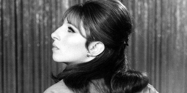 Barbara Streisand in profile, black and white photo