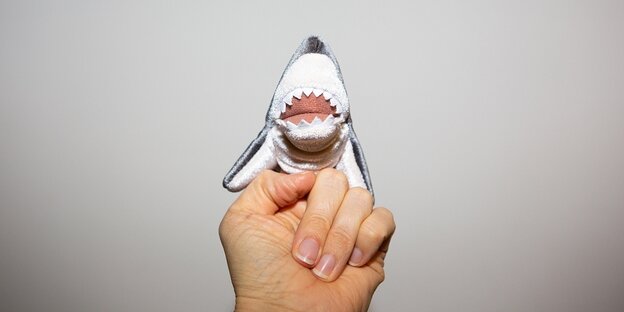A shark as a finger puppet