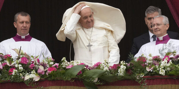 The Pope clutches his head