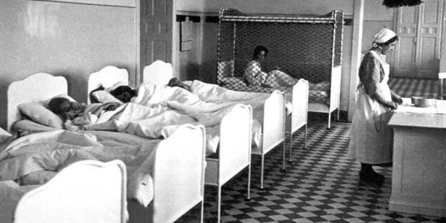 Menschen in einem Krankenzimmer Menschen in einem Krankenzimmer