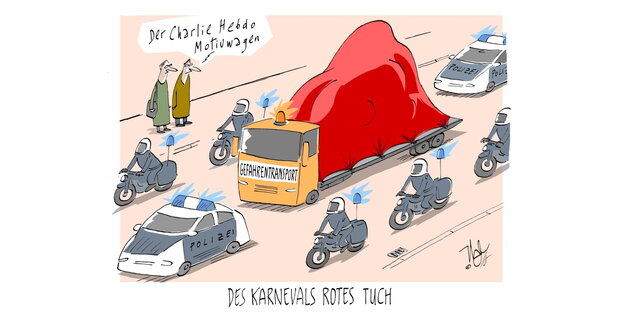 Ein rotes Tuch auf einem LKW umringt von Polizeifahrzeugen Ein rotes Tuch auf einem LKW umringt von Polizeifahrzeugen