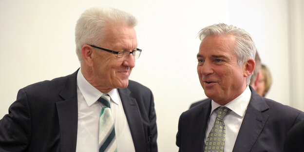 zwei Männer im Anzug nebeneinander, es sind Winfried Kretschmann und Thomas Strobl zwei Männer im Anzug nebeneinander, es sind Winfried Kretschmann und Thomas Strobl