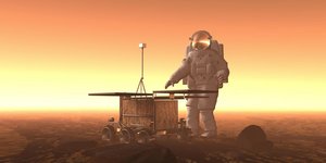 Astronaut mit Roboterfahrzeug auf dem Mars(?)