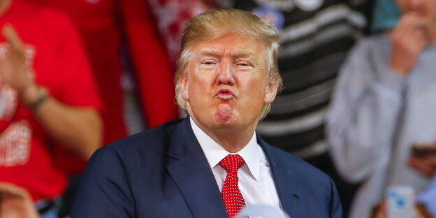 Donald Trump zieht eine Grimasse Donald Trump zieht eine Grimasse