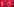 Eine rote Büste von Karl Marx steht vor einem roten Hintergrund, auf dem mehrfach in weiß „Die Linke“ steht