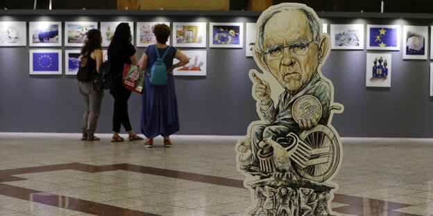 Bild von Wolfgang Schäuble in einer Cartoon-Ausstellung in Athen Bild von Wolfgang Schäuble in einer Cartoon-Ausstellung in Athen