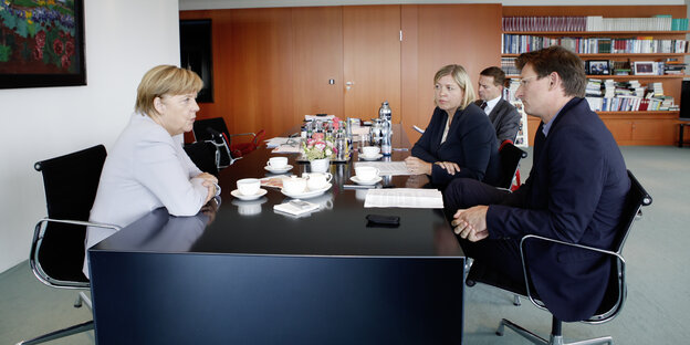 Angela Merkel mit Anja Maier und Georg Löwisch Angela Merkel mit Anja Maier und Georg Löwisch