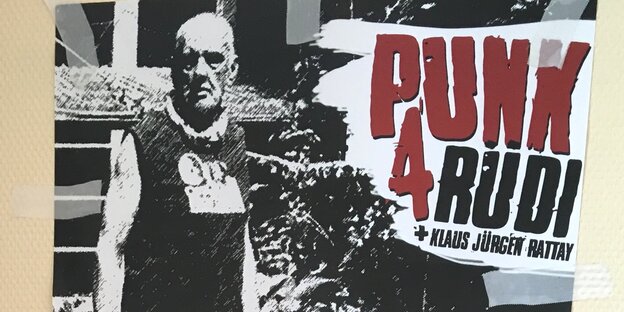 Plakatanriss mit dem verfremdeten Bild eines Mannes und der Aufschrift "Punk für Rüdi und KJ Rattay" Plakatanriss mit dem verfremdeten Bild eines Mannes und der Aufschrift "Punk für Rüdi und KJ Rattay"