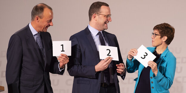 Friedrich Merz, Jens Spahn, Annegret Kramp-Karrenbauer mit Nummern Friedrich Merz, Jens Spahn, Annegret Kramp-Karrenbauer mit Nummern
