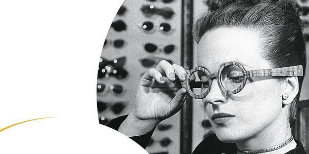 eine junge Frau mit einer extravaganten runden Brille eine junge Frau mit einer extravaganten runden Brille