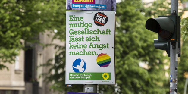 Wahlplakat der Grünen an einem Laternenpfahl Wahlplakat der Grünen an einem Laternenpfahl