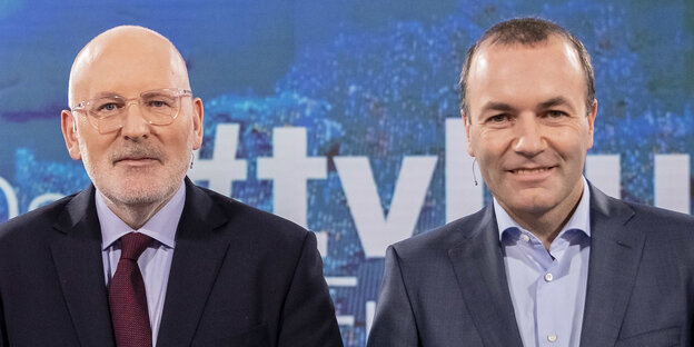 Frans Timmermans und Manfred Weber stehen vor dem TV-Duell zur Europawahl für ein Foto zusammen Frans Timmermans und Manfred Weber stehen vor dem TV-Duell zur Europawahl für ein Foto zusammen